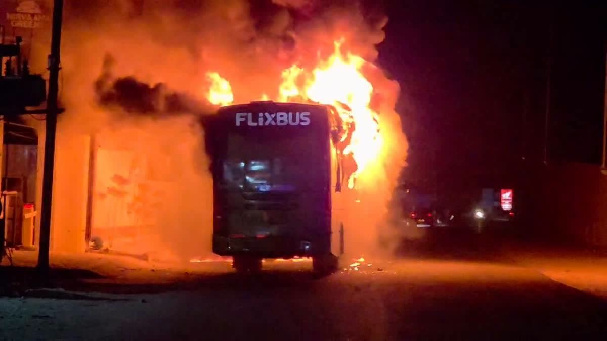 The bus in flames along the highway near Badheri Rajputana village.