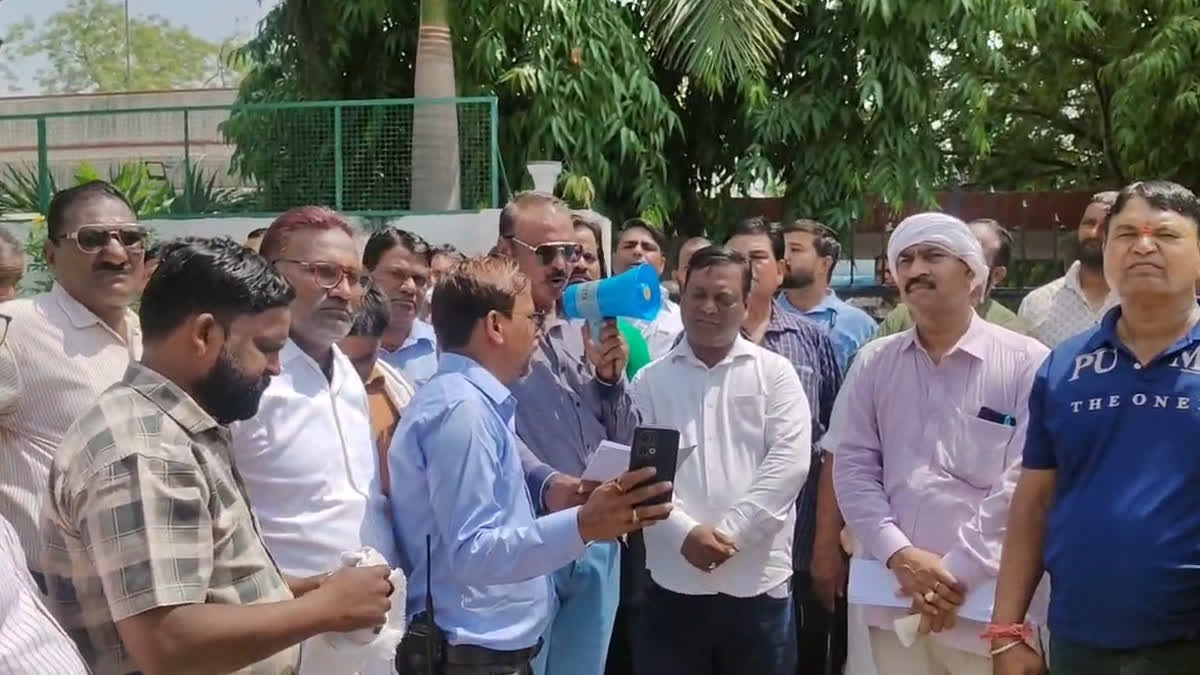 Sanitation workers protesting at the Local Self-Government Building