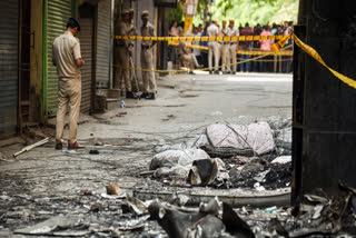 Ten police personnel were hospitalised after entering the fire-hit building.