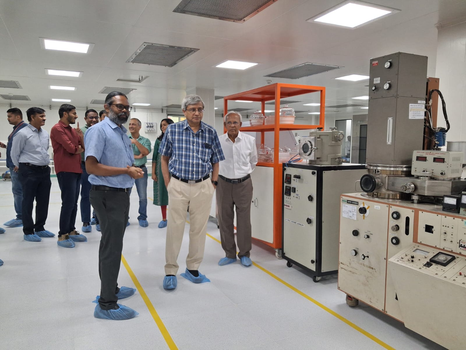 Prof. Shankar Kumar Selvaraja, Associate Chair, CeNSE, IISc, and Principal Investigator of the Semiconductor Fabrication and Characterisation Training Programme, gives a tour of the training facility to Prof. Govindan Rangarajan, Director, Indian Institute of Science