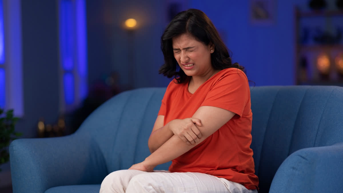 Woman having joint pain