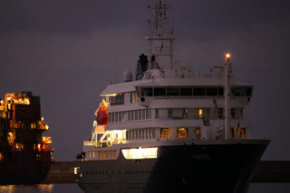 The hantavirus-stricken cruise ship MV Hondius is seen at anchor after arriving at the port of Granadilla in Tenerife, Canary Islands, Spain, Sunday, May 10, 2026.