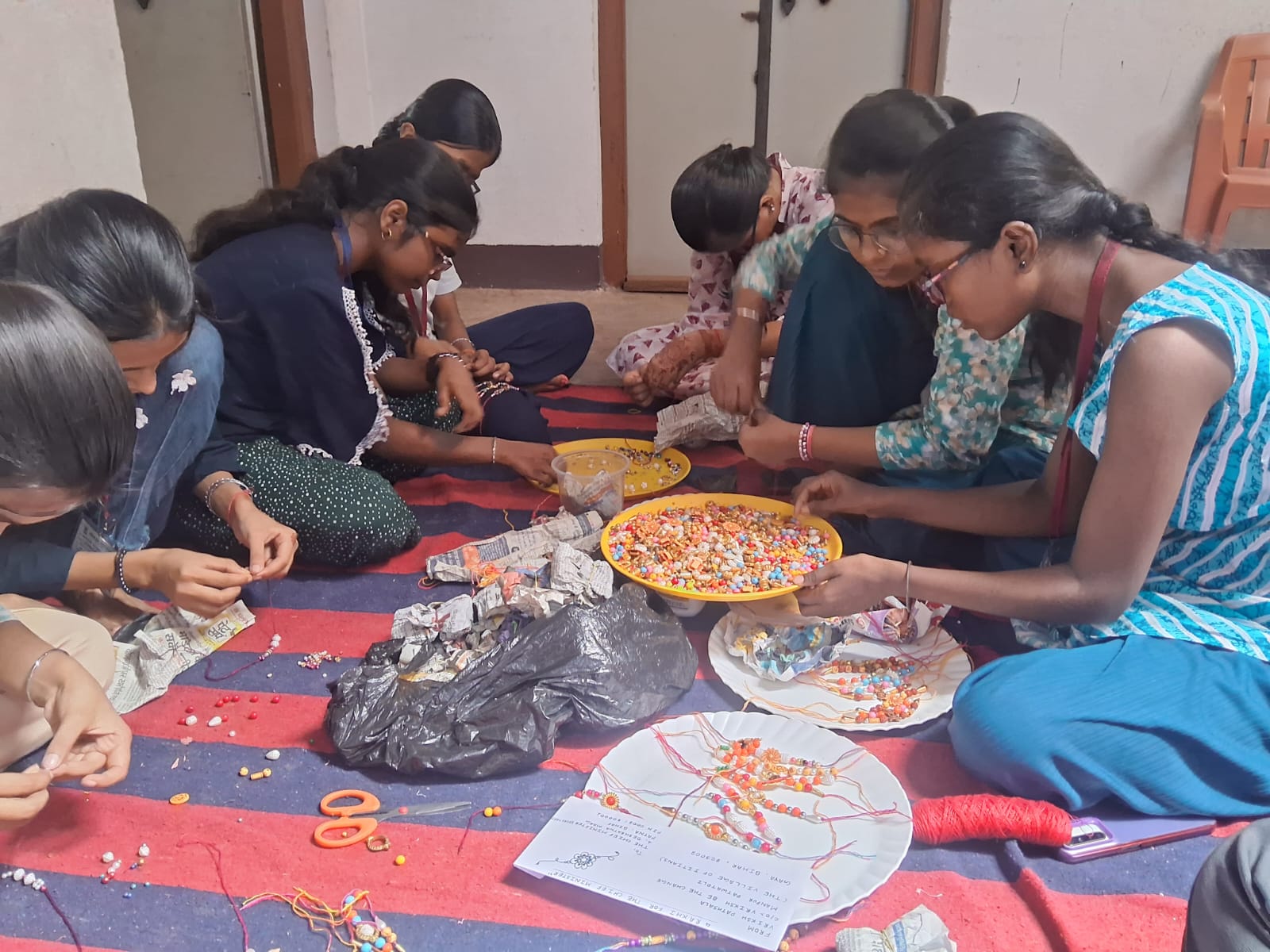 Students making special Rakhis in Gaya's Patwatoli.