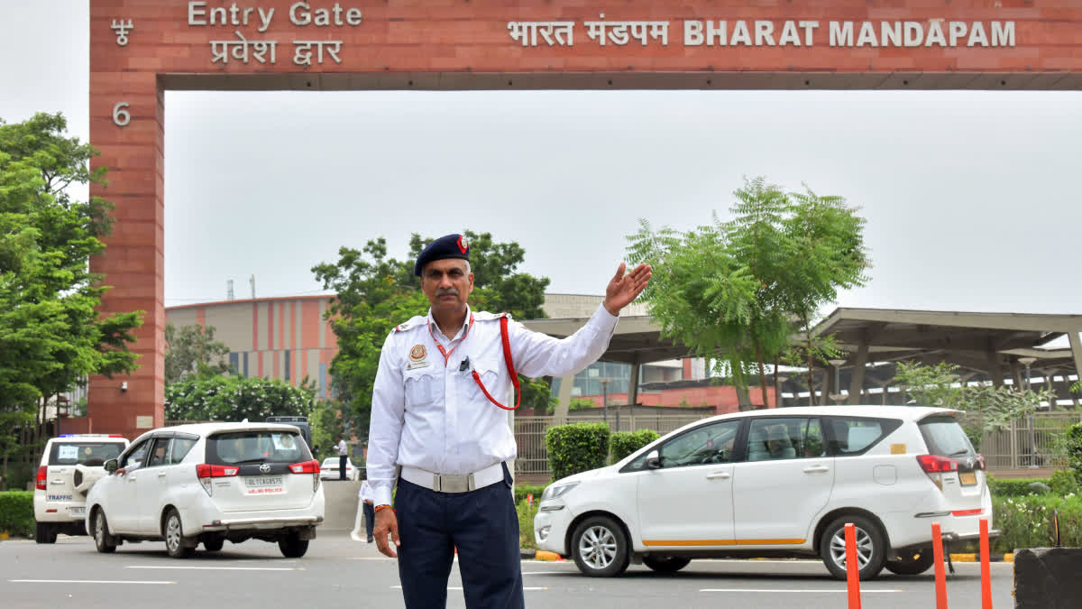 Delhi Traffic Police personnel manage traffic during preparations for the BRICS Summit in the capital.