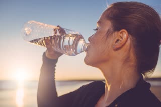 HOW MUCH WATER TO DRINK A DAY