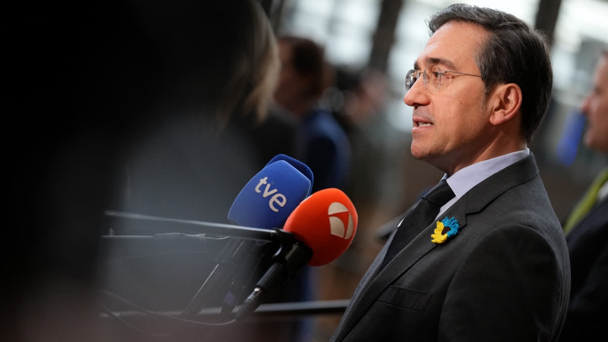 Spain's Foreign Minister Jose Manuel Albares Bueno speaks with the media as he arrives for a meeting of EU foreign ministers at the European Council building in Brussels, Monday, Feb. 23, 2026.