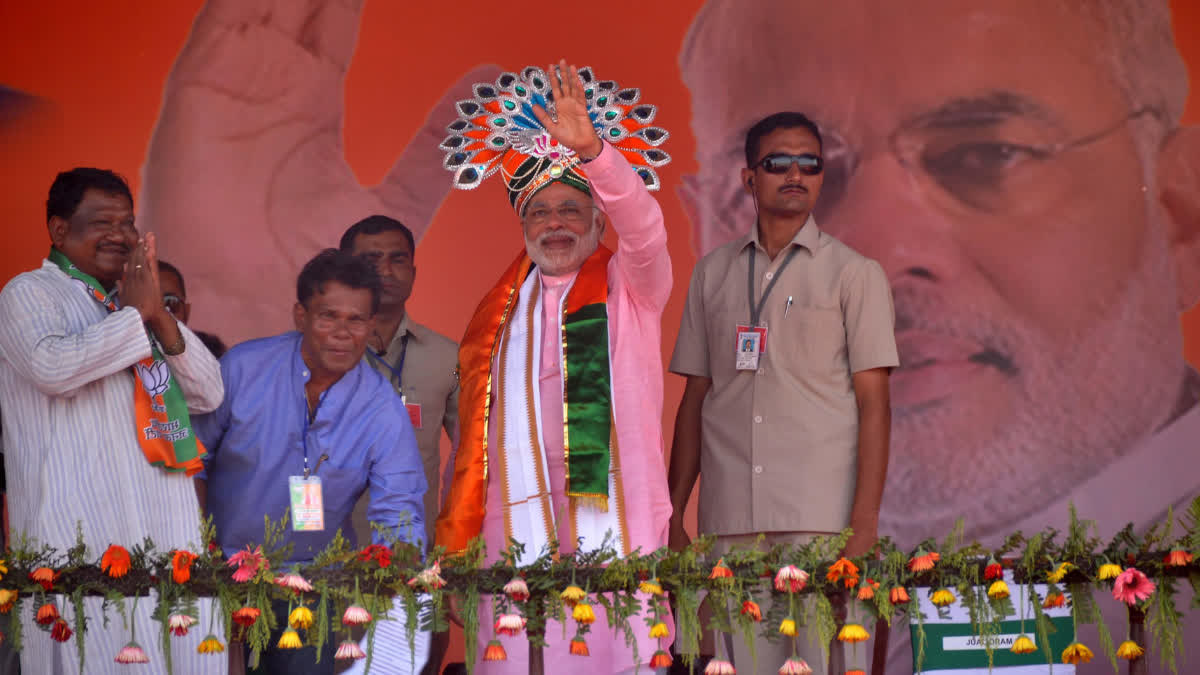 File photo of Dilip Roy with then BJP Prime Ministerial candidate Narendra Modi from 2014