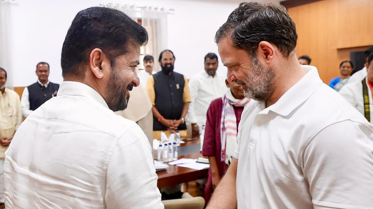Congress MP and Lok Sabha Leader of Opposition Rahul Gandhi(R) meets Telangana CM Revanth Reddy along with other party leaders in Delhi