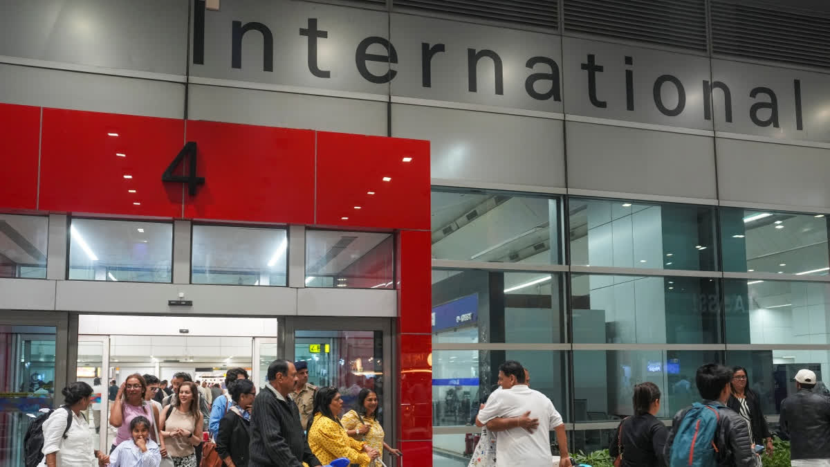 Indian expatriates returning from Abu Dhabi arrive at the Indira Gandhi International Airport, in New Delhi, Monday, March 2, 2026.