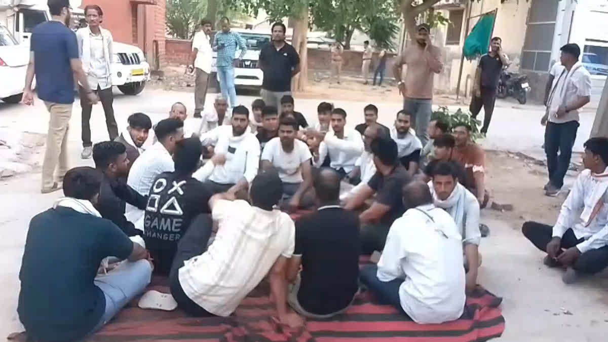 Relatives from the deceased woman's maternal side staging a sit-in outside the mortuary.