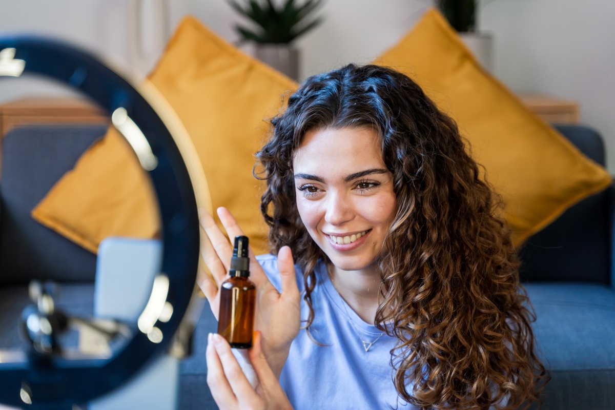 Influencer with a bottle of tincture