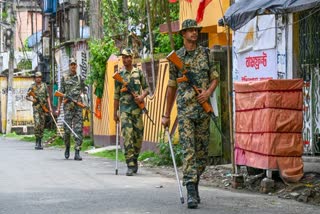 A file photo of security personnel conduct a route march to maintain law and order ahead of the results for the West Bengal Assembly elections in Uttar Dinajpur.