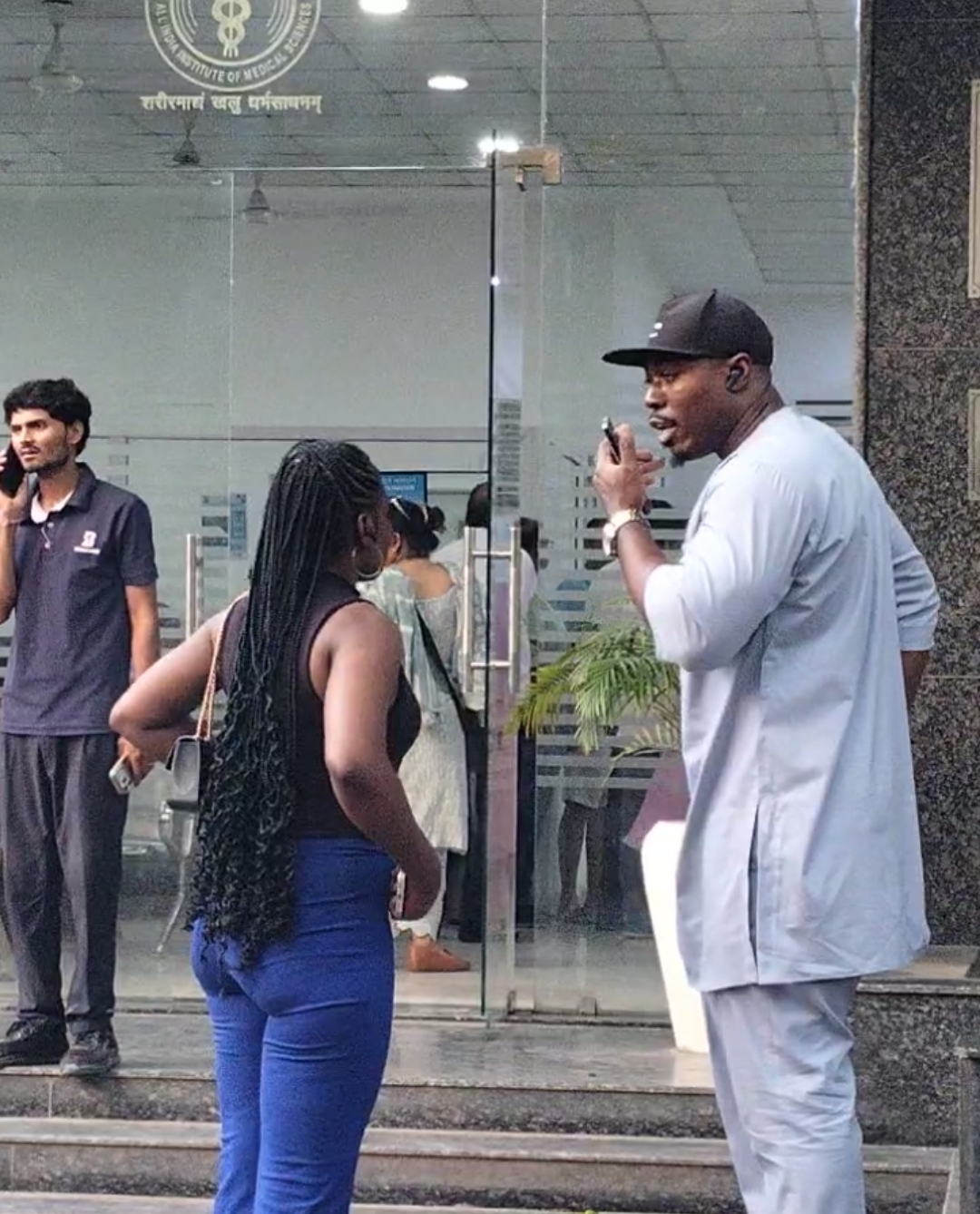 Relatives outside mortuary.