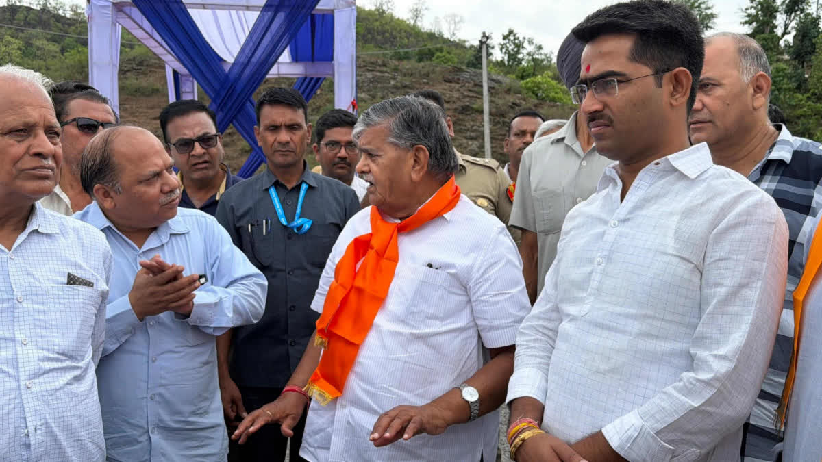 Kataria gathering information about the project from officials.