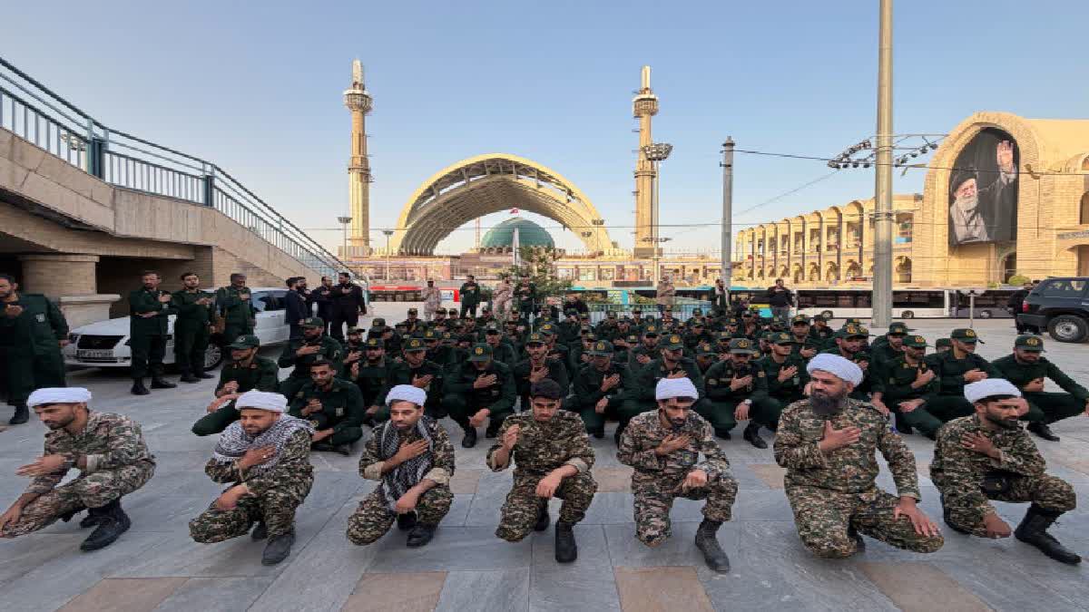 Revolutionary Guard members and clerics mourn on the esplanade of the Imam Khomeini Mosalla Grand Mosque as preparations are underway ahead of the dayslong funeral ceremonies for slain Iranian Supreme Leader Ayatollah Ali Khamenei in Tehran, Iran, Friday, July 3, 2026.
