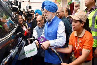 Union Minister for Petroleum and Natural Gas Hardeep Singh Puri fills E85 fuel in a car during the during the launch of E85 fuel on World Environment Day at an Indian Oil fuel station on Pusa Road, in New Delhi on June 5 2026