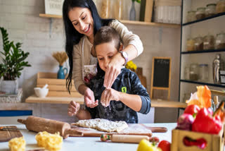 Mother and son cooking