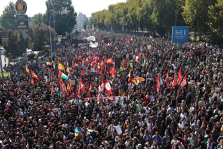 Demonstrators gather for a pro-Palestinians protest in Bologna, Italy, Friday, Oct. 3, 2025.