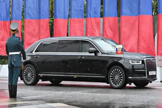 In this pool photograph distributed by Russian state agency Sputnik, a Russian-made limousine Aurus Senat carriyng Russia's president-elect Vladimir Putin leaves for his inauguration ceremony at the Kremlin in Moscow on May 7, 2024