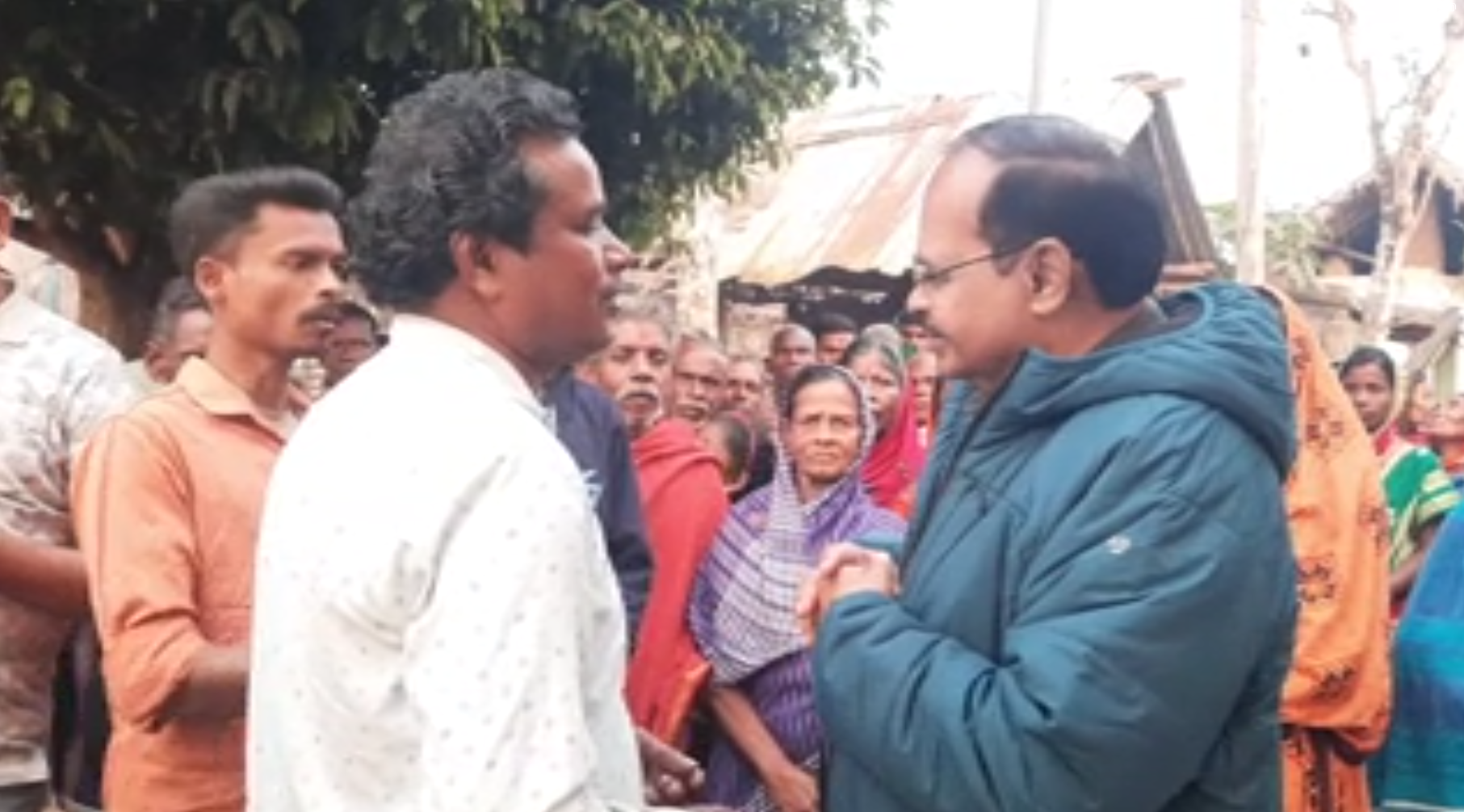 MLA discussing with villagers