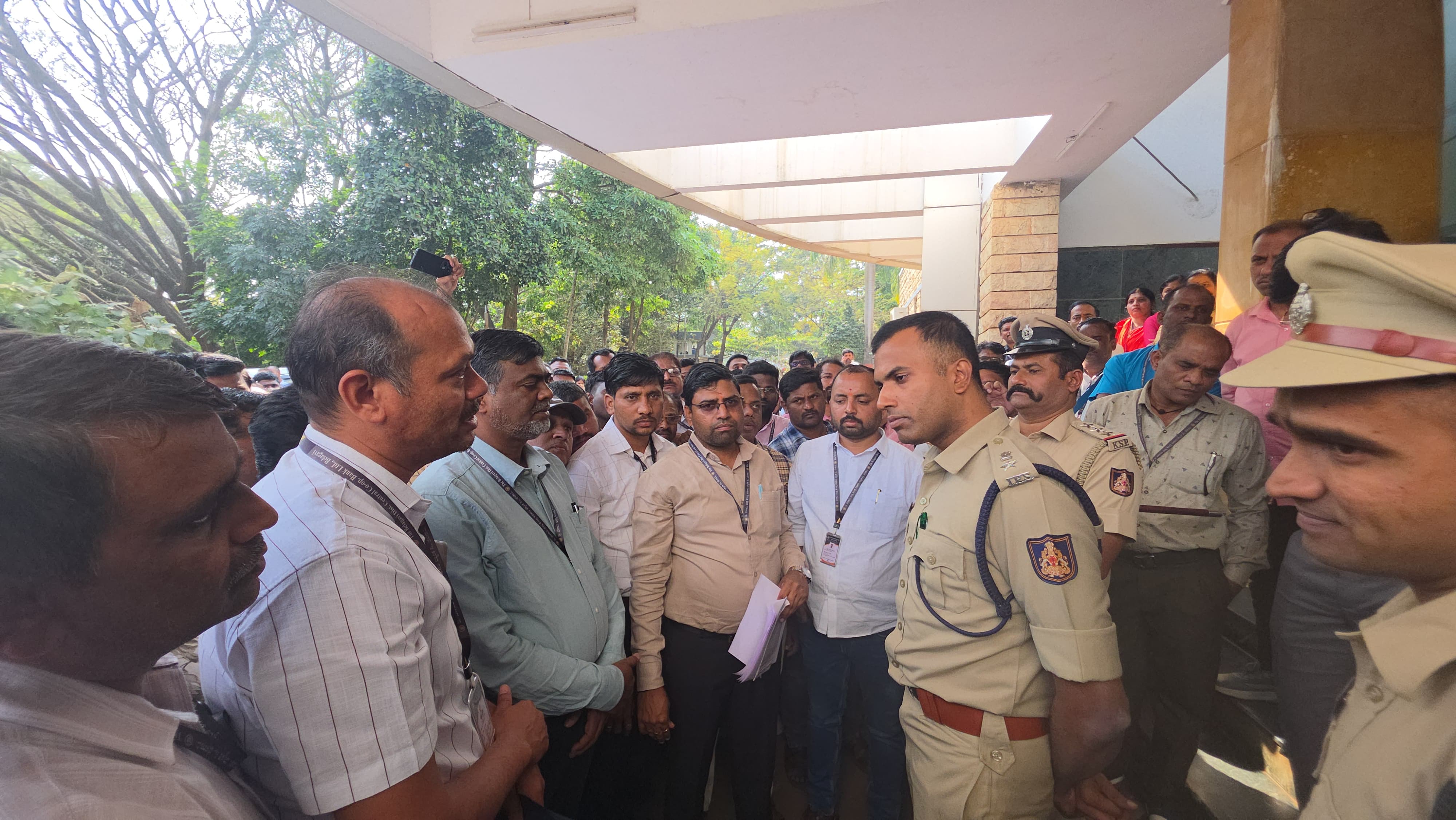 DCC Bank employees protest in Belagavi condemning the assault