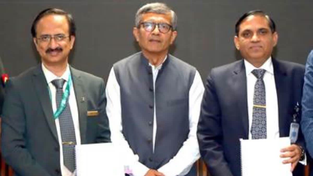 Defence Secretary Kumar Singh with BEL executives during the signing of the contract in New Delhi on Monday.