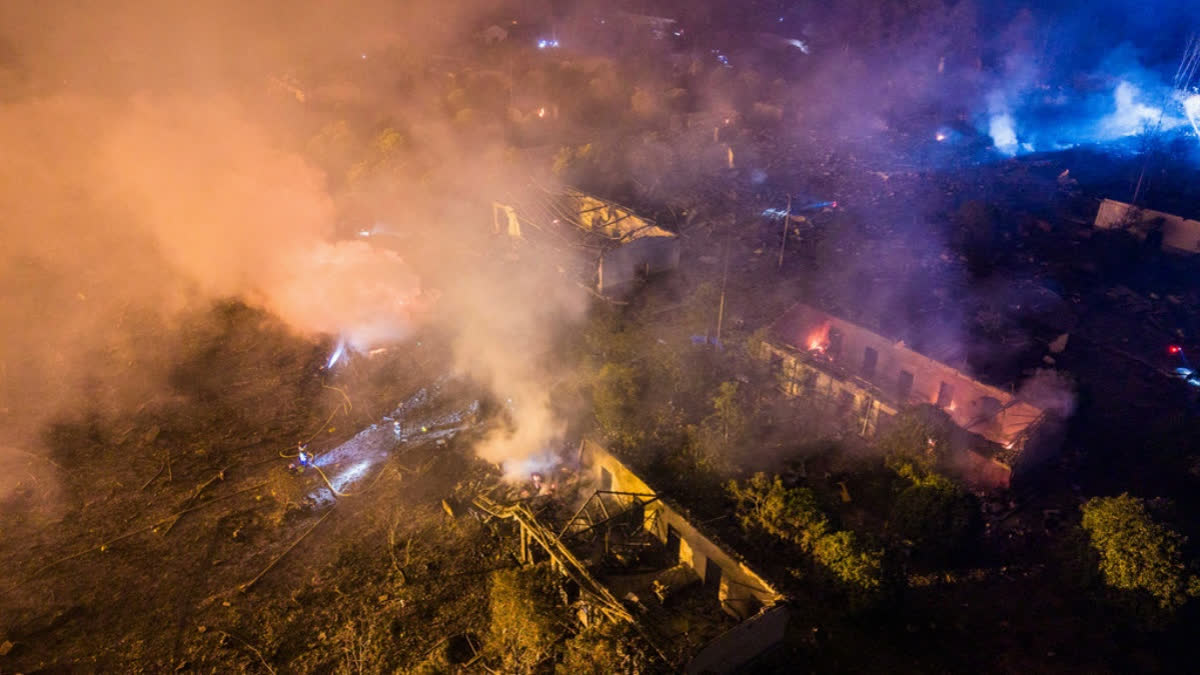 In this photo released by Xinhua News Agency, this aerial drone photo taken in the early hours of May 5, 2026, rescuers work on site after an explosion at a fireworks plant in Guandu Town of Liuyang, central China's Hunan Province.