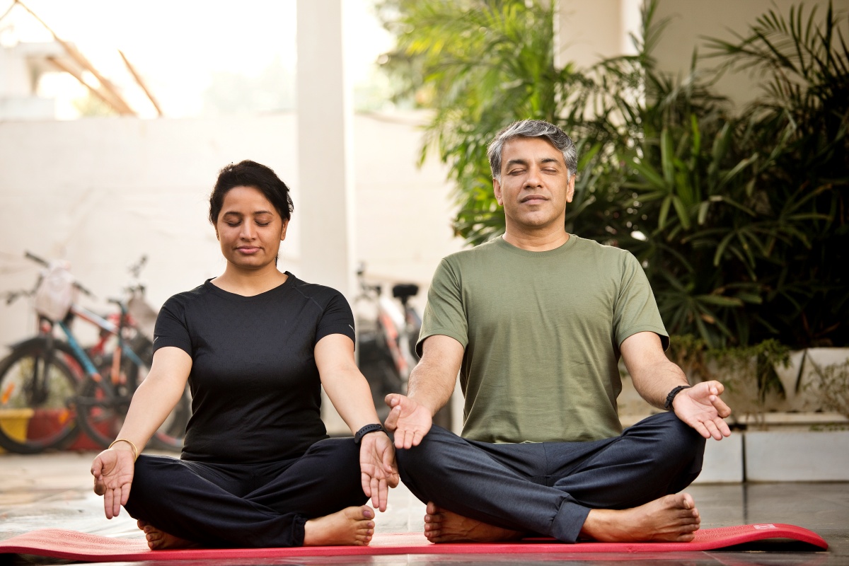 Two people doing pranayama