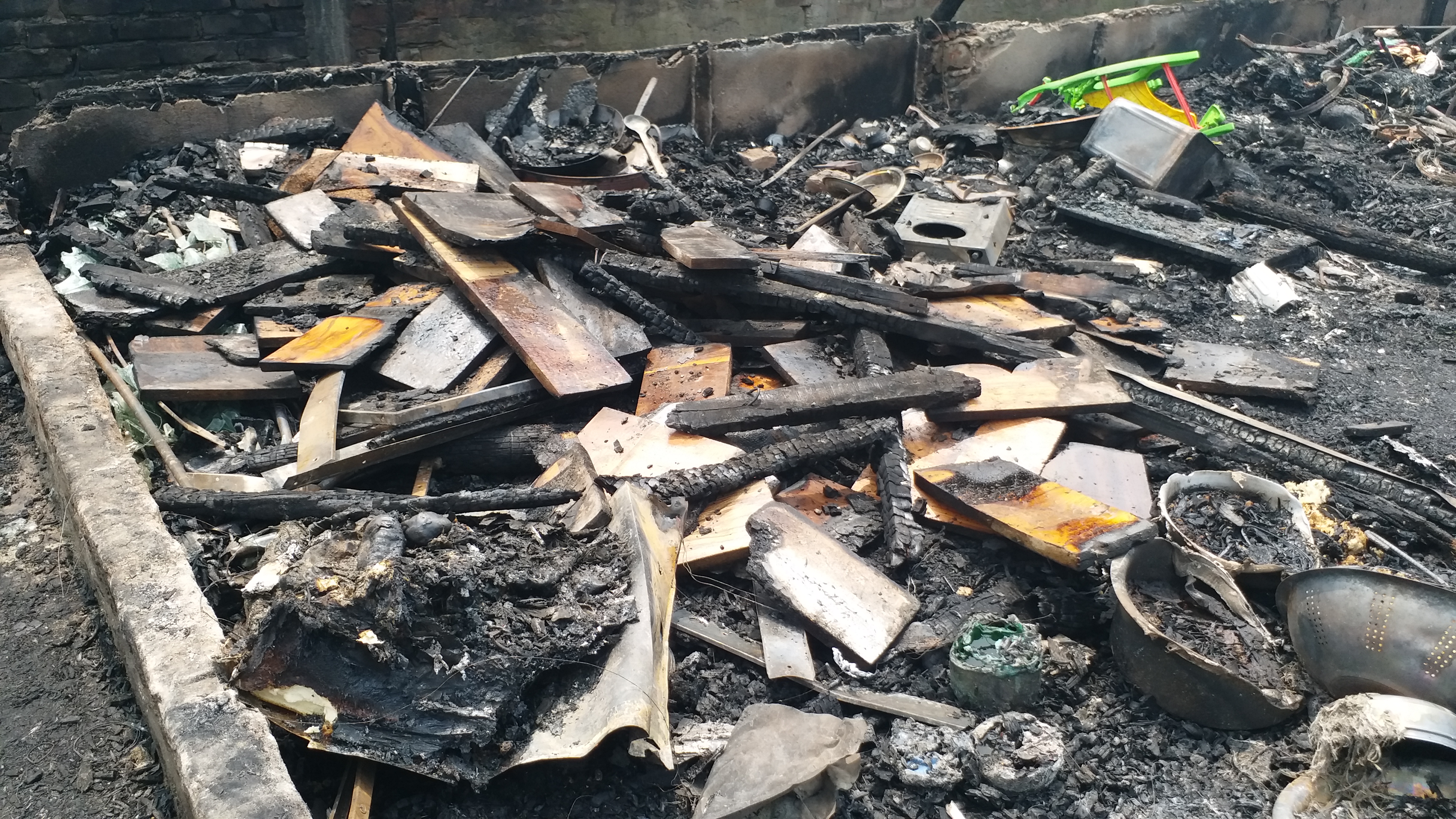 Four members of family charred to death in a midnight house fire in Guwahati Jalukbari area