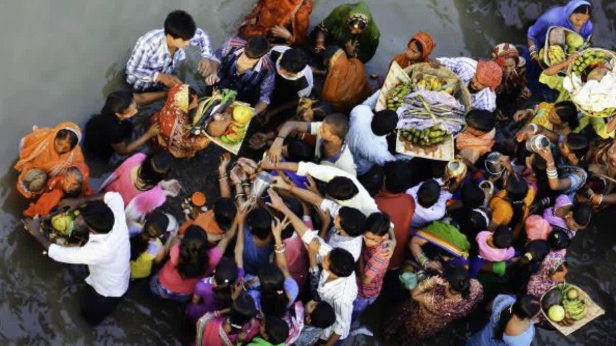 A file photo of devotees performing rituals during Chhath Puja.