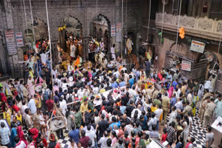 Devotees pay obeisance at Sri Bankey Bihari Temple, in Vrindavan on Friday, August 8, 2025.