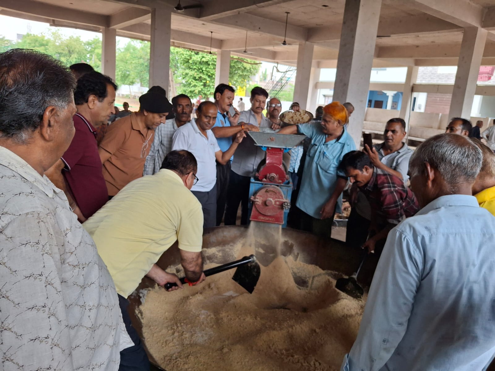 People of the community preparing churma