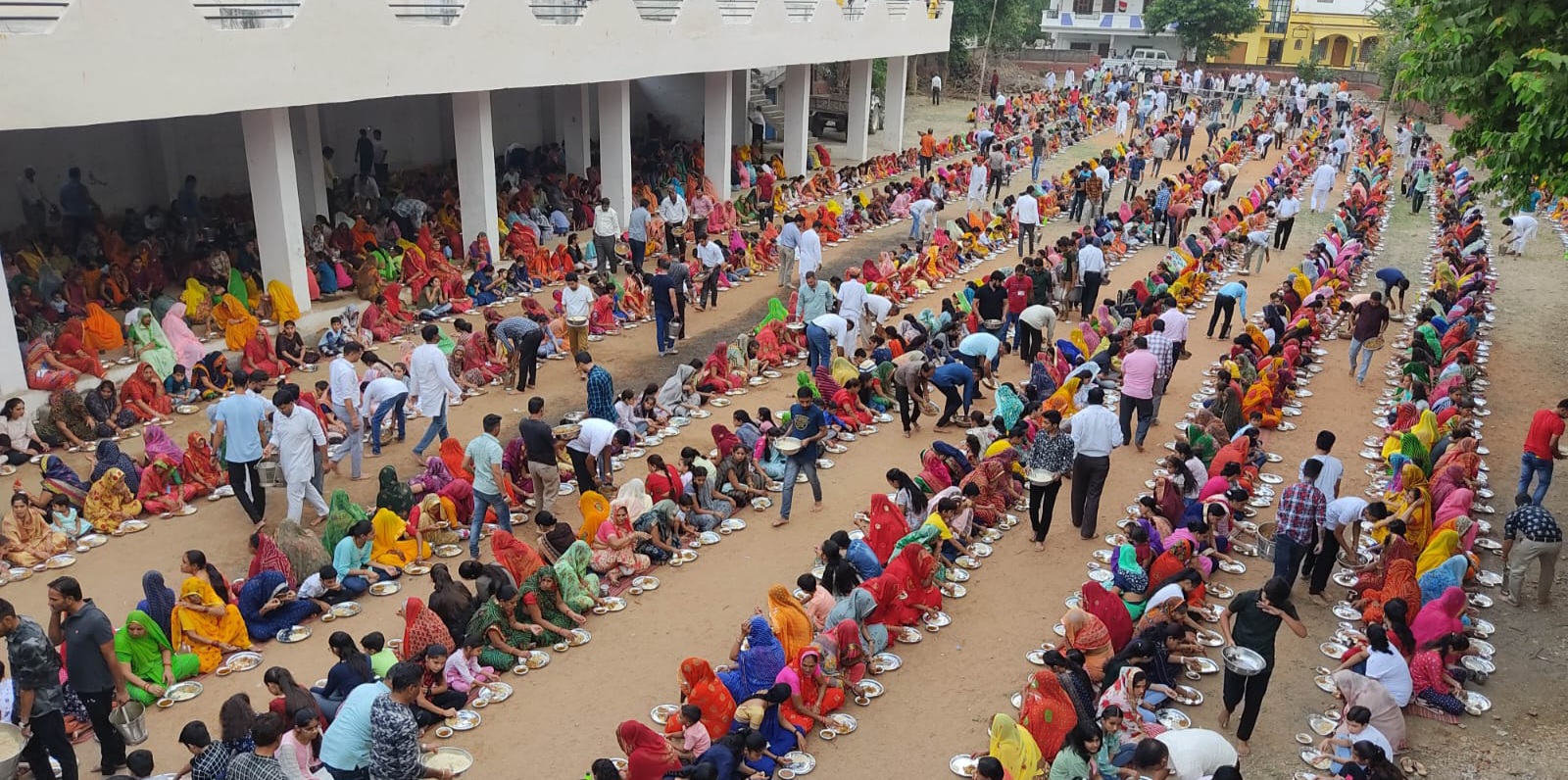 People sitting in rows and eating together