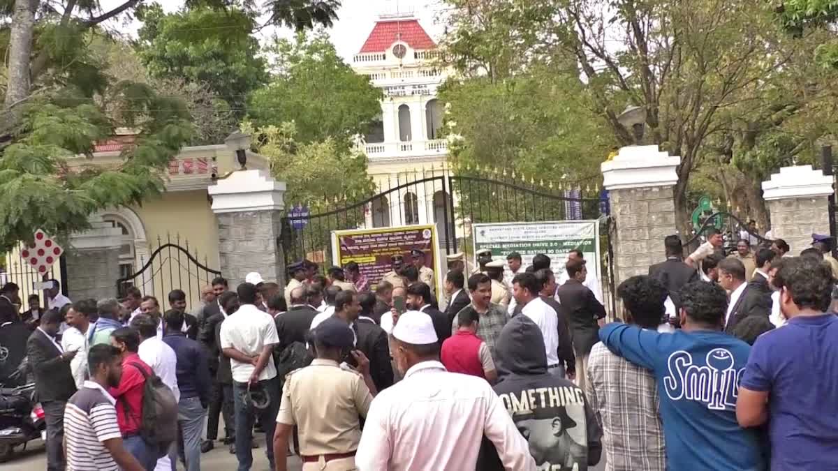 Lawyers and clients gathered in the court premises
