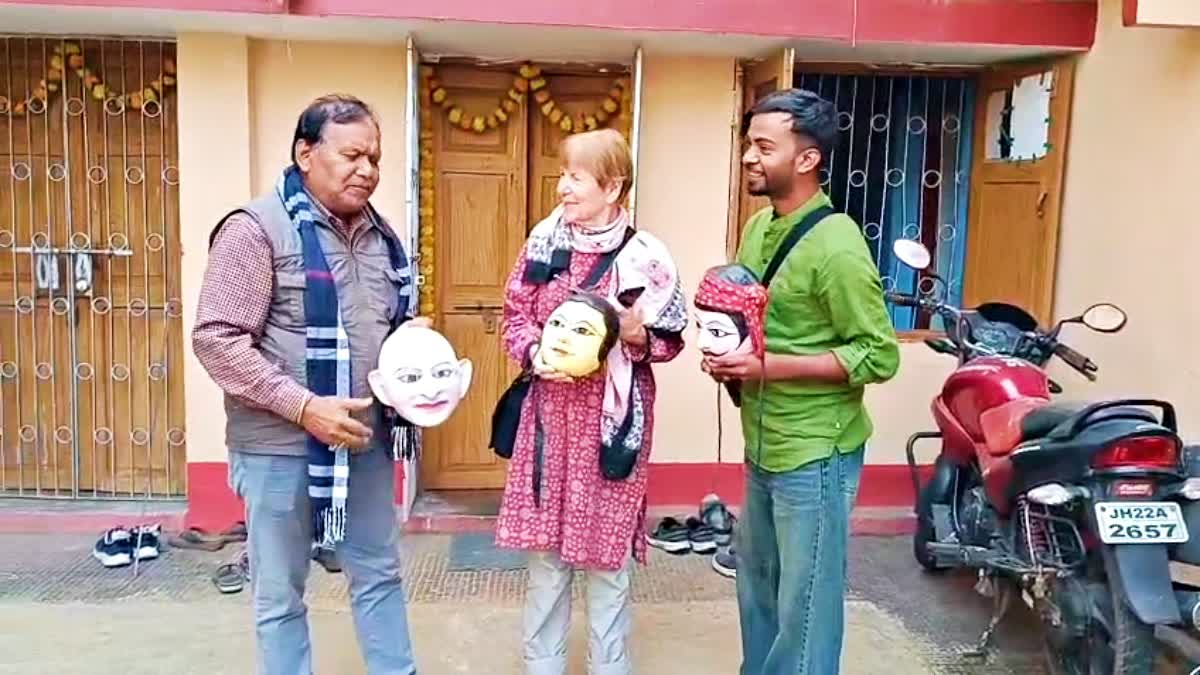 French art enthusiast Giselle Busson immersed in vibrant colors of Chhau dance in Seraikela
