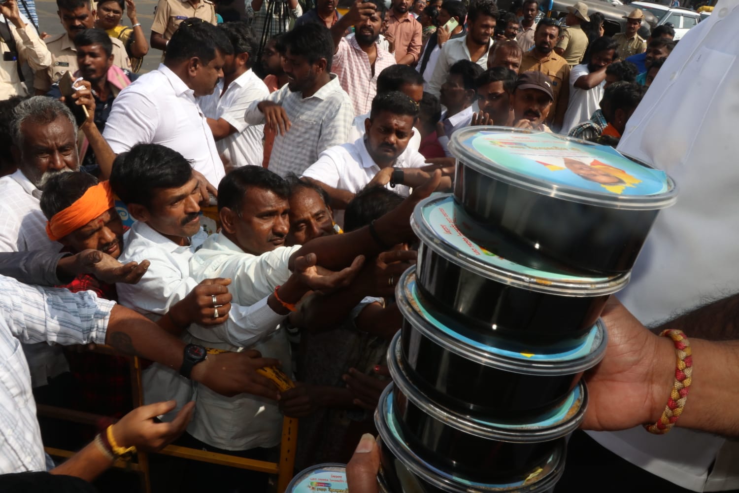 Siddaramaiah's fans distribute chicken biryani in Shivamogga
