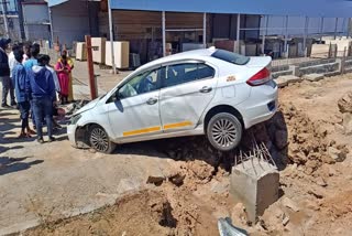 A CAR CRASHED INTO A BESIDE CAR AND JUMPED OVER THE DIVIDER WITH IT.