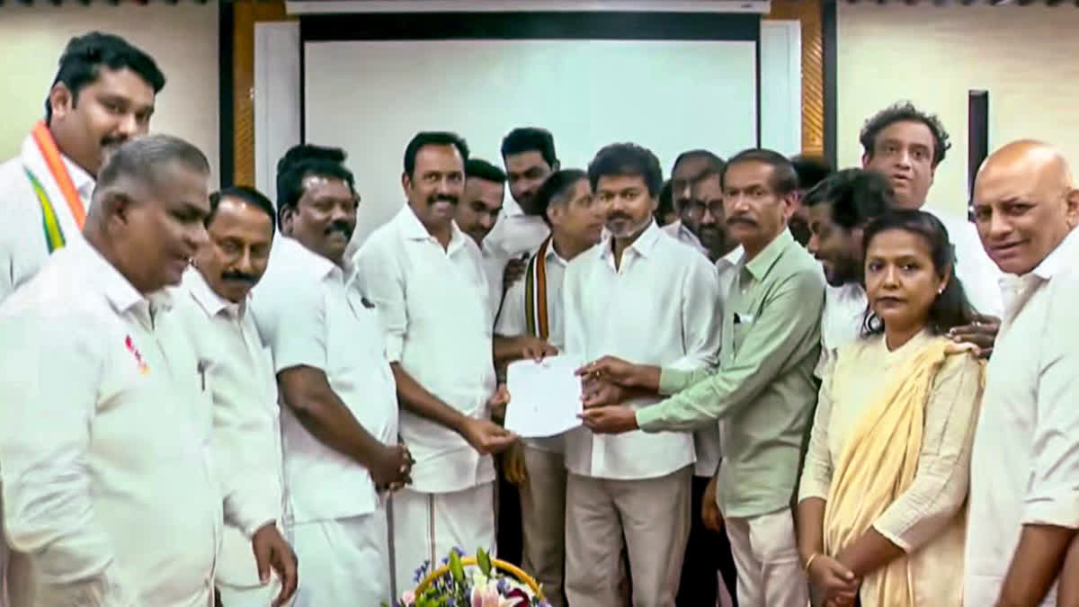 TVK chief Vijay receives a letter of support from Tamil Nadu Congress Committee leaders for government formation, in Chennai.