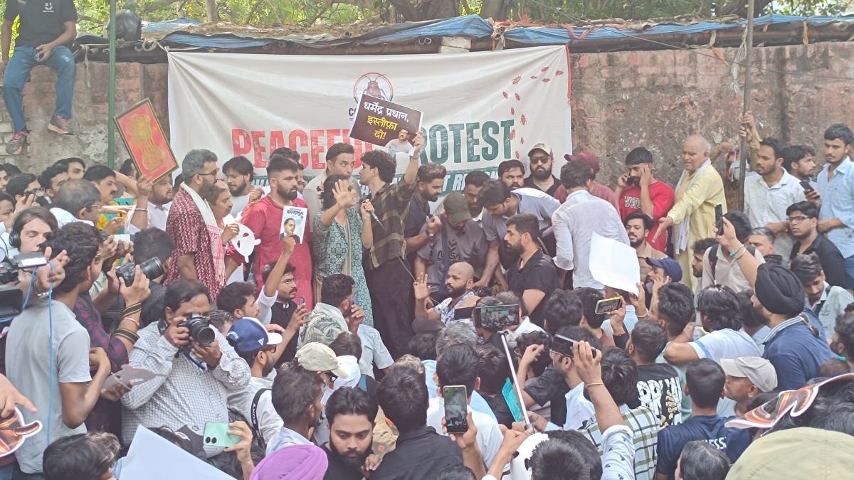 Protestors gather at a demonstartion organised by Cockroach Janata Party demanding the resignation of Union Education Minister Dharmendra Pradhan over alleged examination-related lapses, at the Jantar Mantar, in New Delhi, Saturday