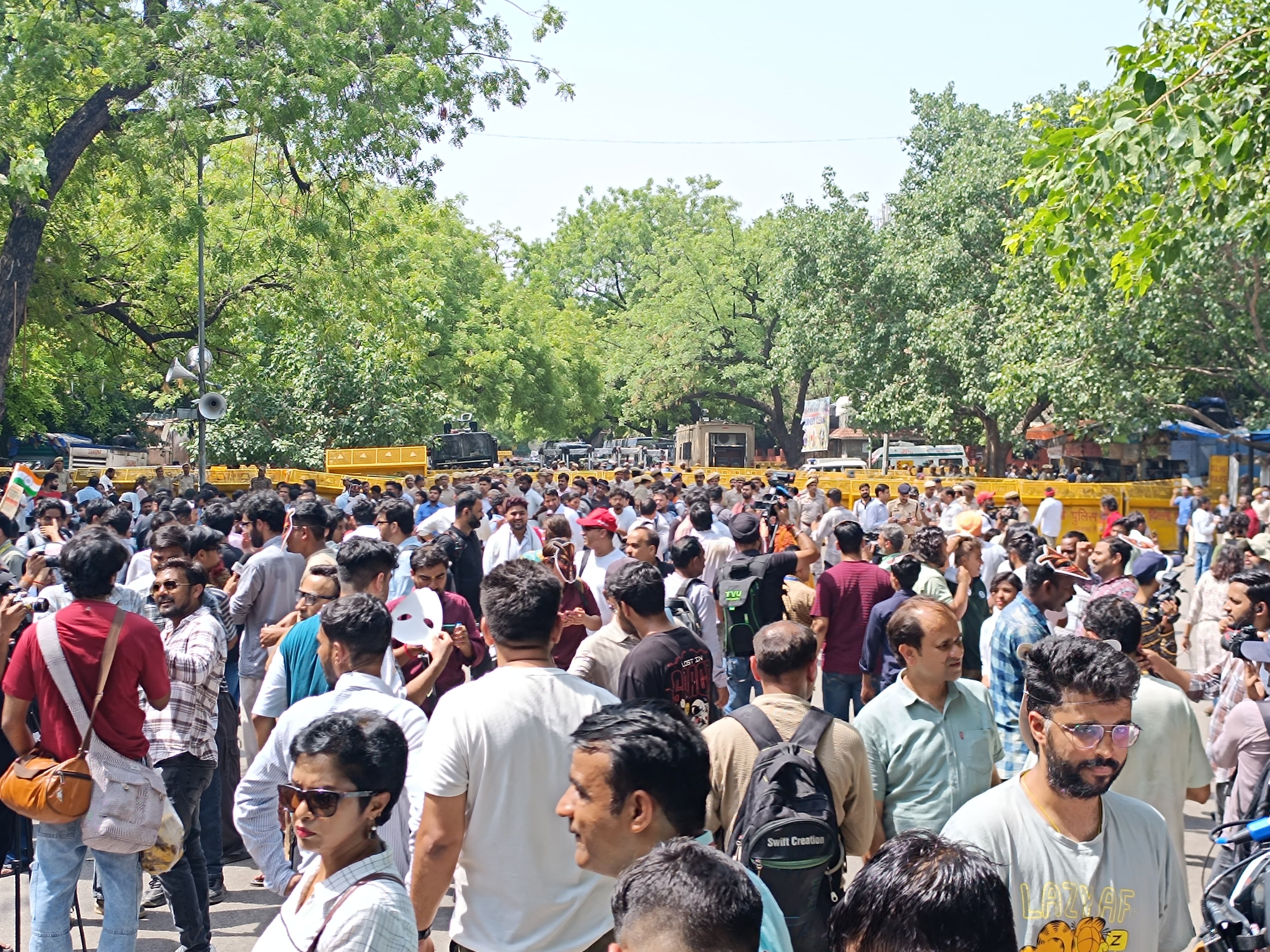 Protestors gather at a demonstartion organised by Cockroach Janata Party demanding the resignation of Union Education Minister Dharmendra Pradhan over alleged examination-related lapses, at the Jantar Mantar, in New Delhi, Saturday