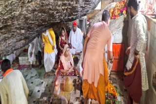 Devotees worshiping at Adharshila Mahadev Temple