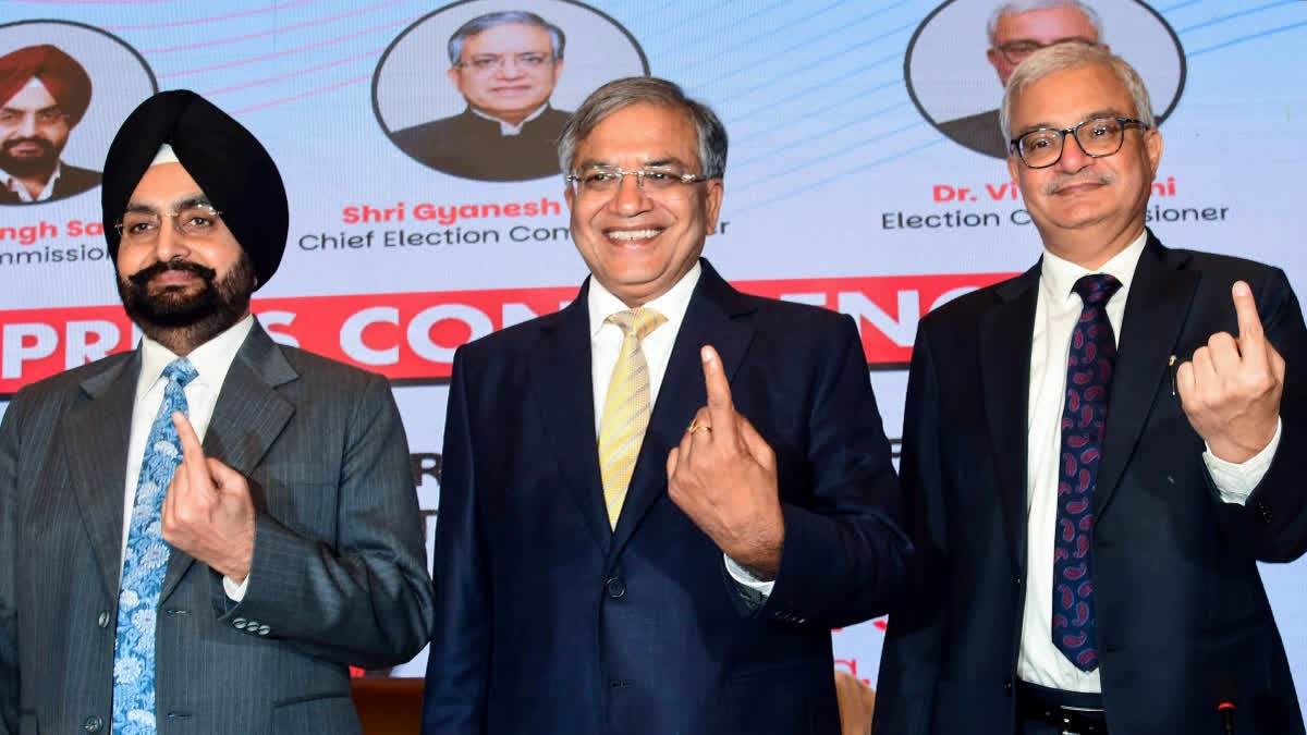 Chief Election Commissioner Gyanesh Kumar and Election Commissioners Sukhbir Singh Sandhu and Vivek Joshi pose for a picture with showing index fingers during a Press Conference on review of poll preparedness for forthcoming Assembly Elections in Bihar, in Patna, on Sunday