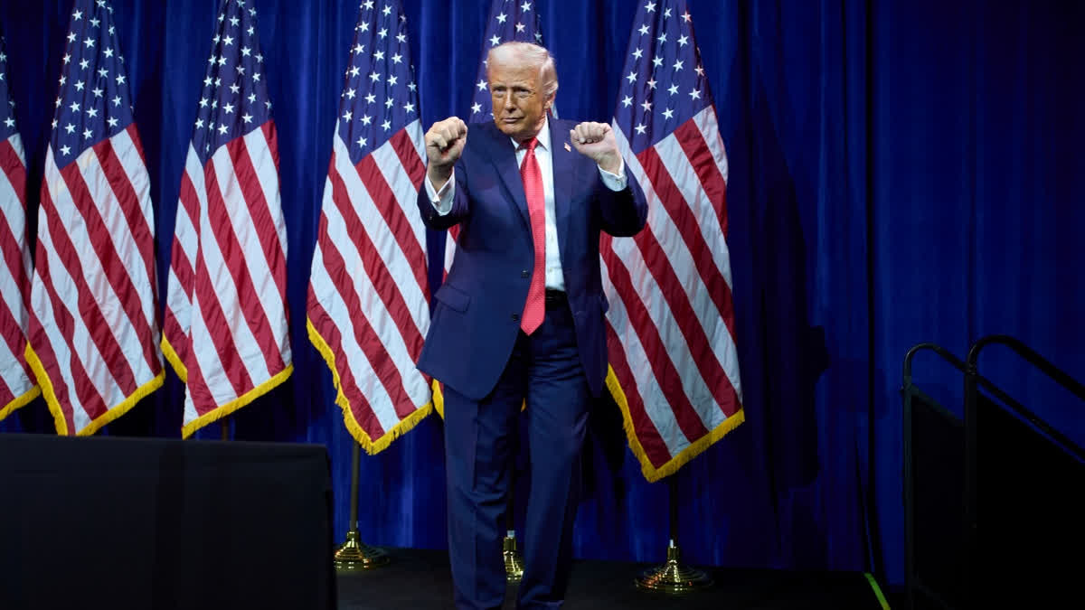 President Donald Trump dances as he walks off stage after speaking to House Republican lawmakers during their annual policy retreat, Tuesday, Jan. 6, 2026, in Washington.