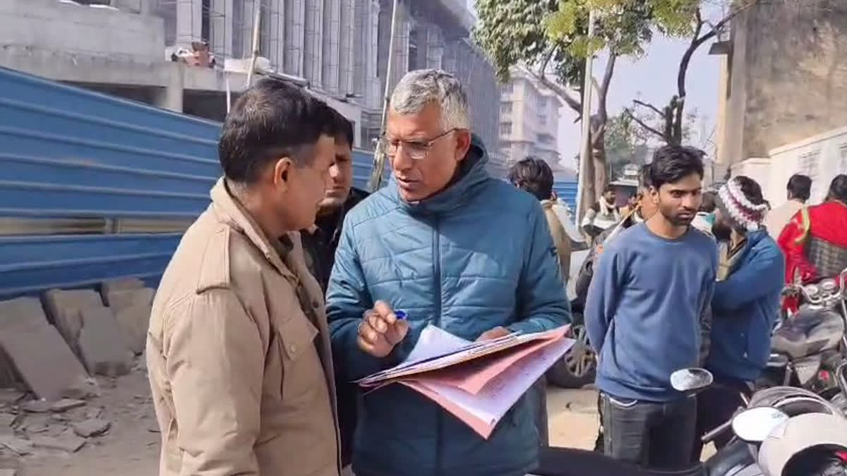 Police officers conducting the post-mortem examination after the murder