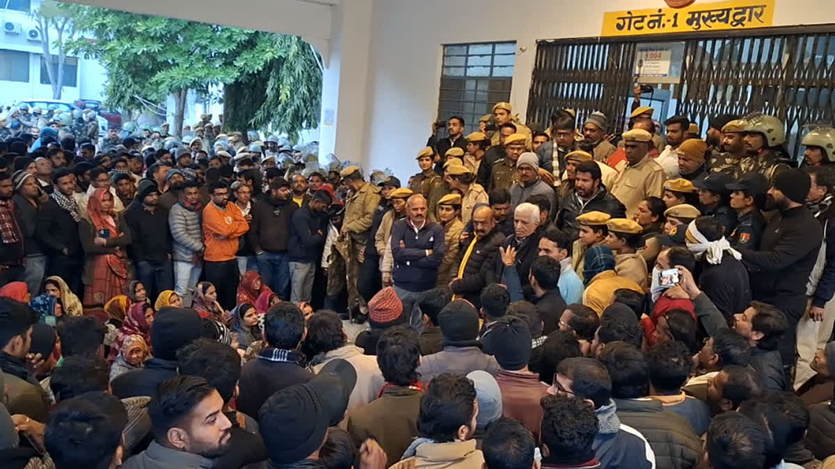 Angry people gathered at collectorate gate