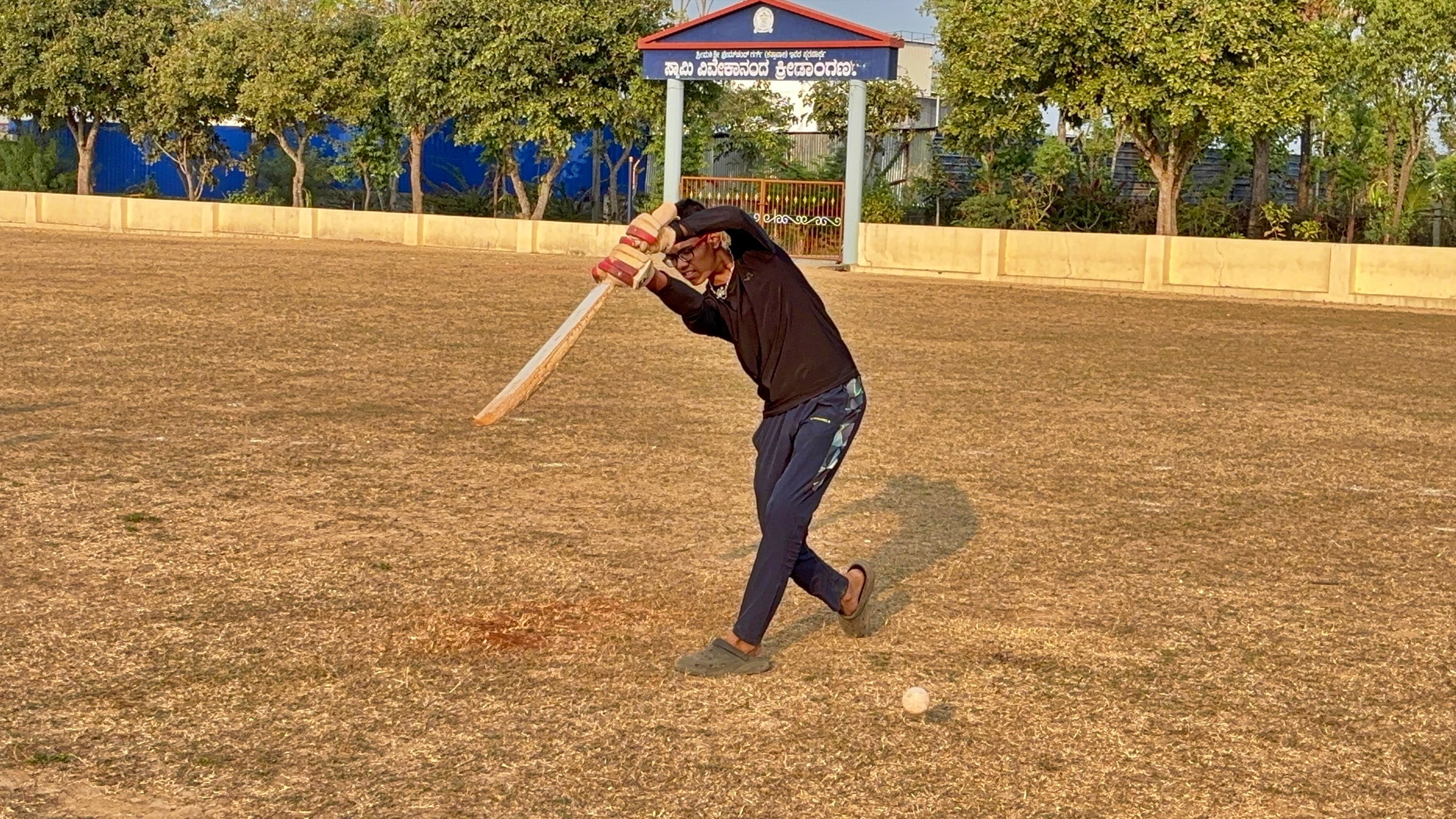 Blind student playing cricket