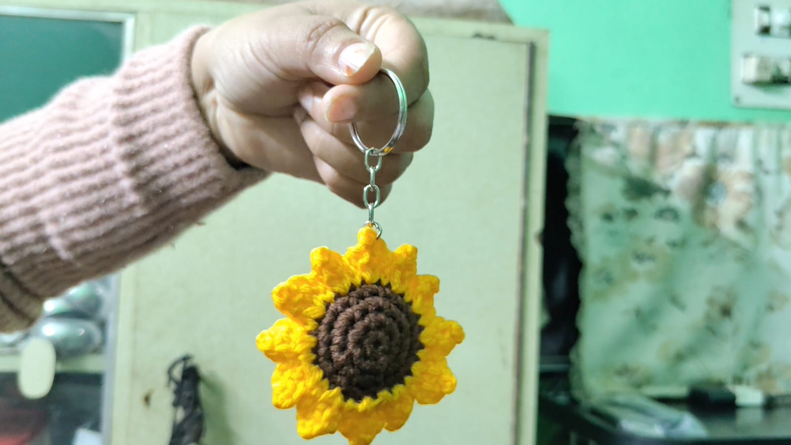 A woman has become self-reliant by making various items from wool yarn in Guwahati