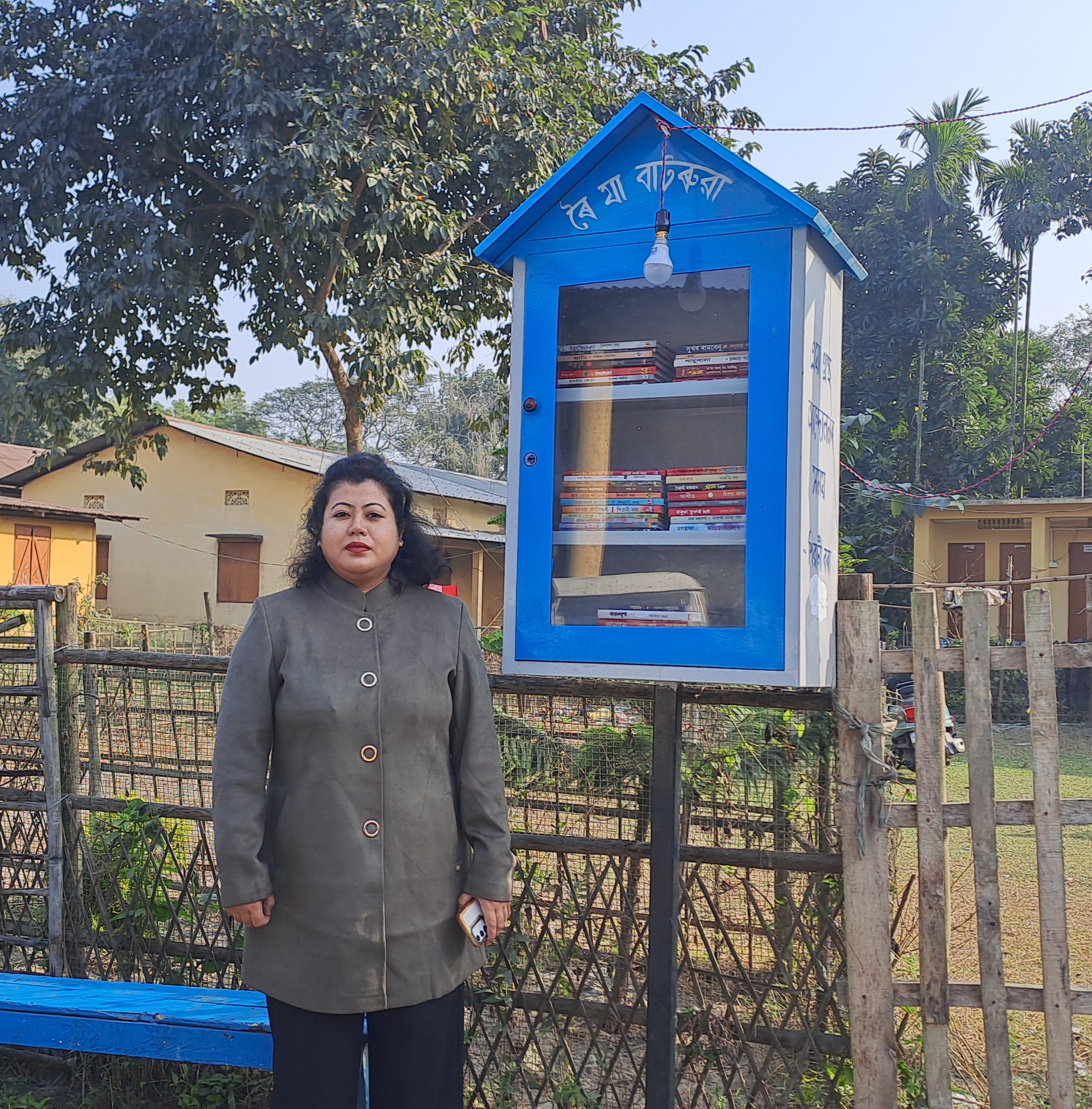 A writer has set up a small library by the roadside at Mukalmua in Nalbari