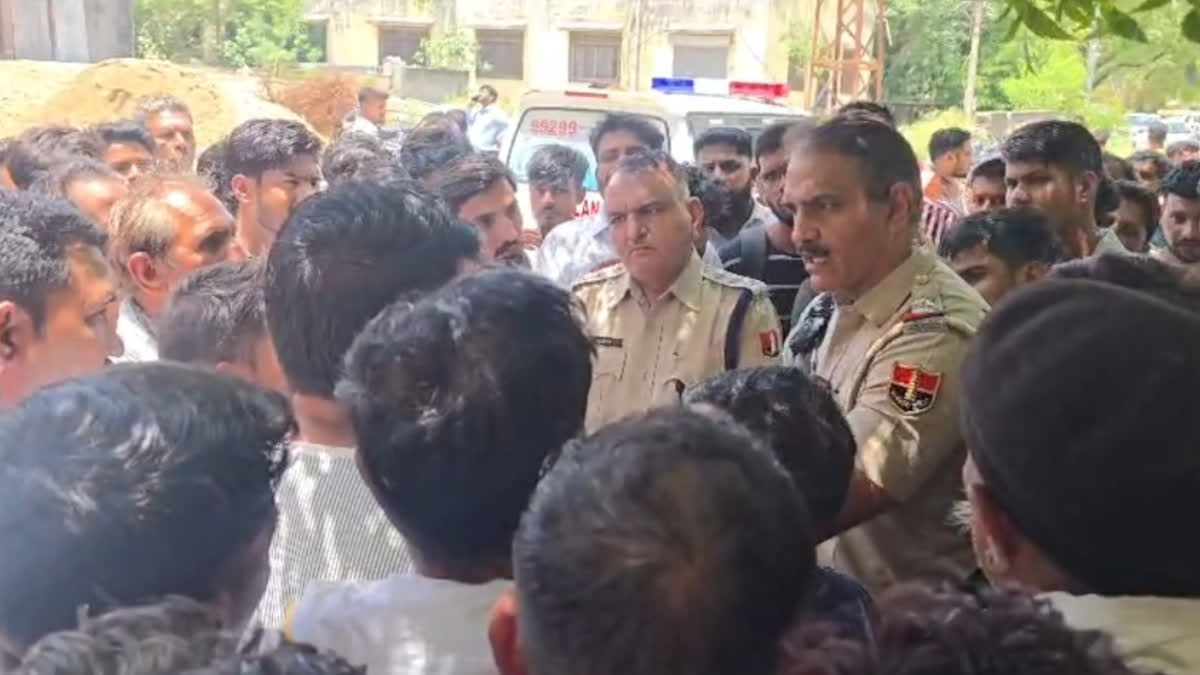 Police engaging in dialogue with villagers