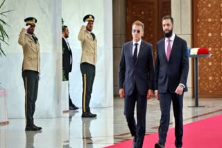 Syrian President Ahmad al-Sharaa, right, meets French President Emmanuel Macron at the presidential palace in Damascus, Syria, Tuesday, July 7, 2026.